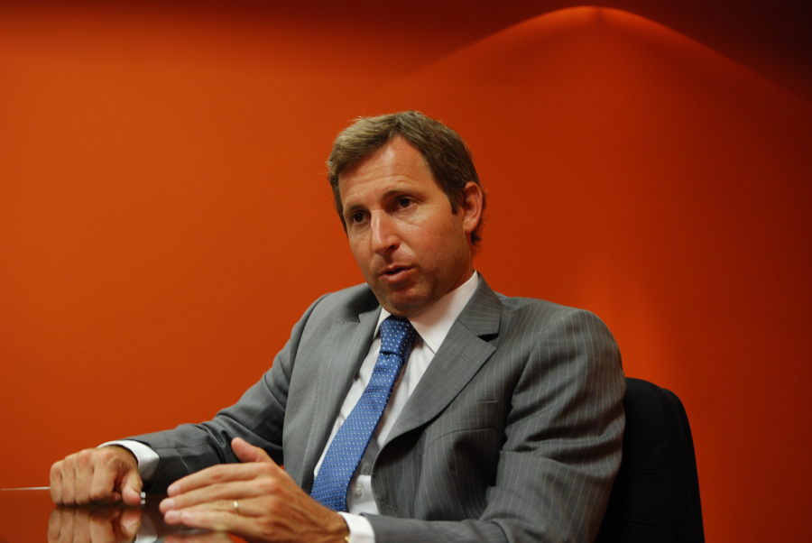 Frigerio junto a Delfino